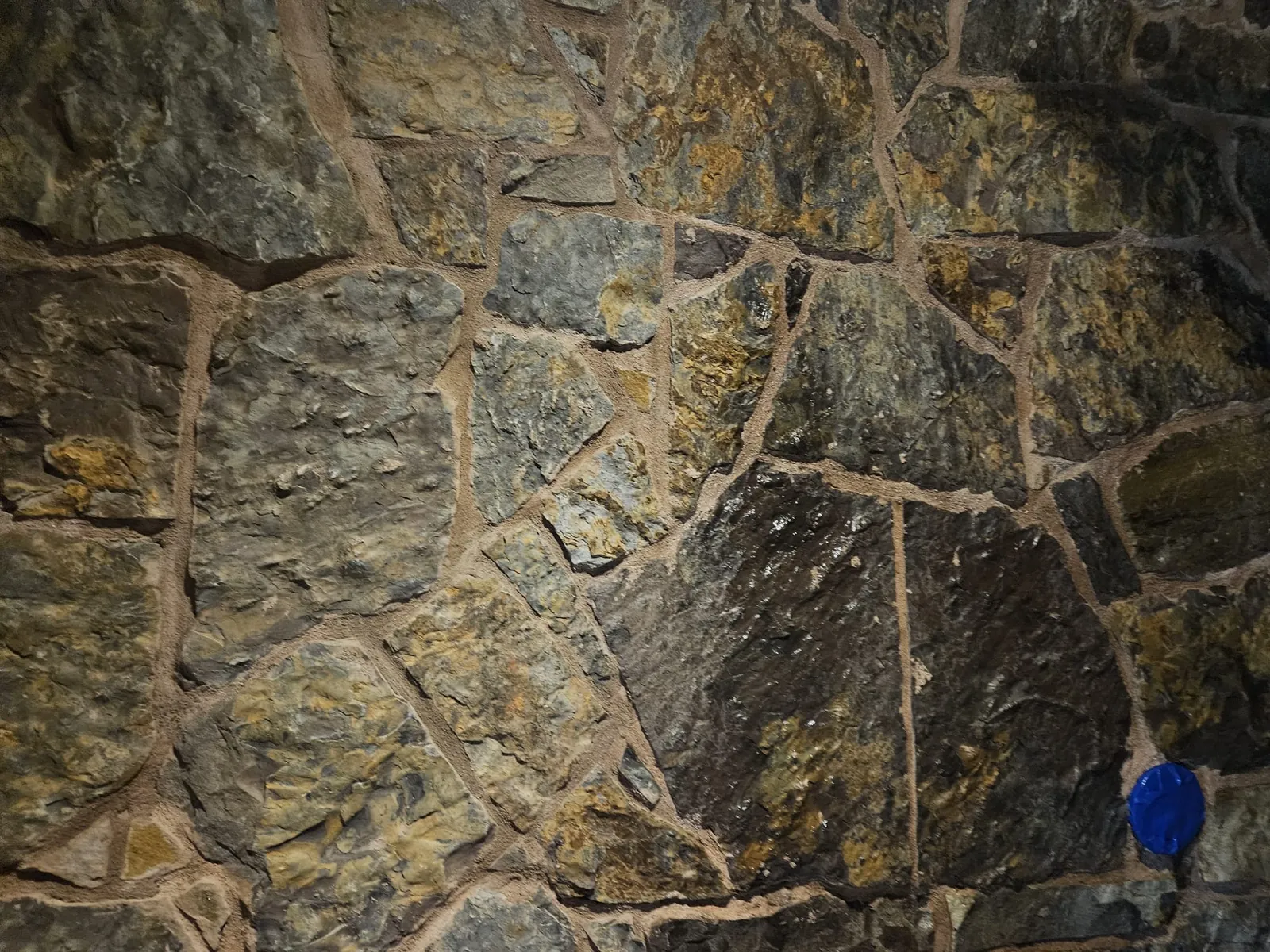 Cracked grout and mortar joint before professional repair
