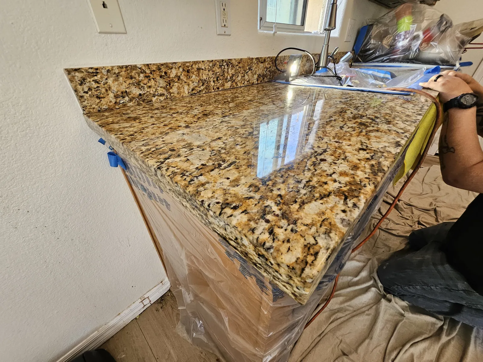 Granite countertop corner polished after detail work