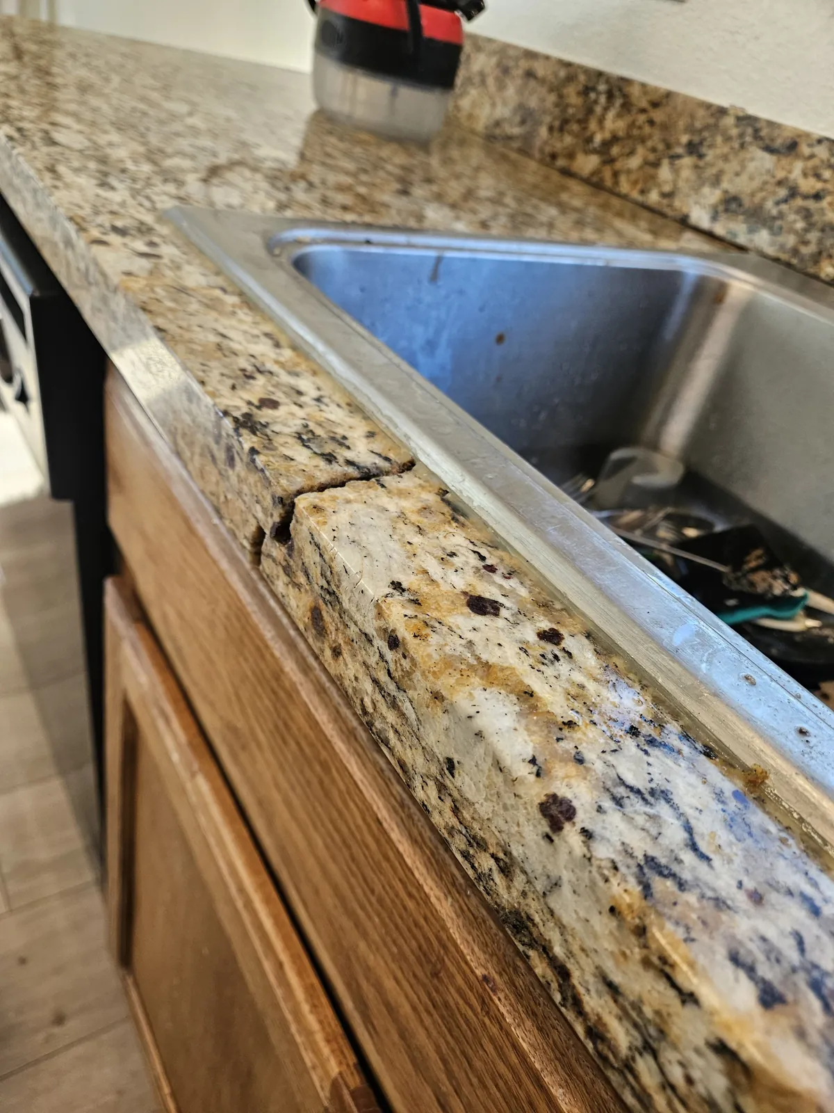 Stone countertop damage before repair in Las Vegas