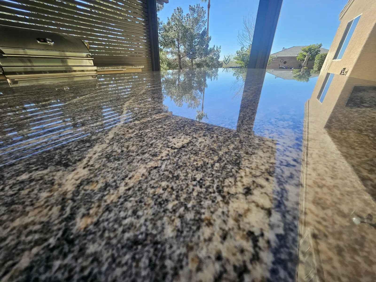 Outdoor granite BBQ counter polished to a mirror finish