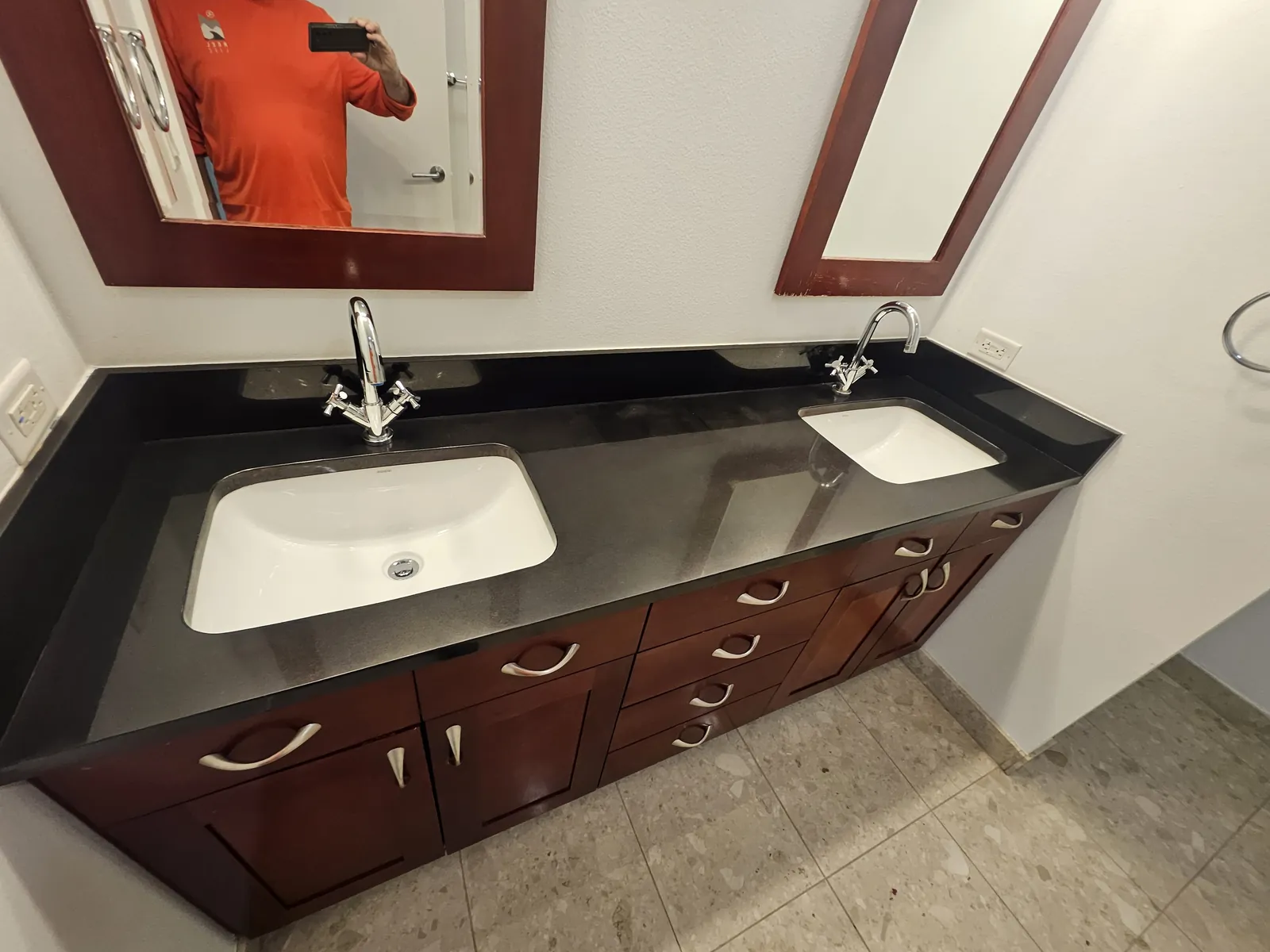 Black granite double vanity restored near Panorama Towers