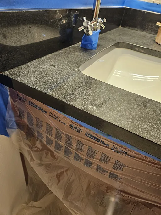 Black granite vanity top after sealing