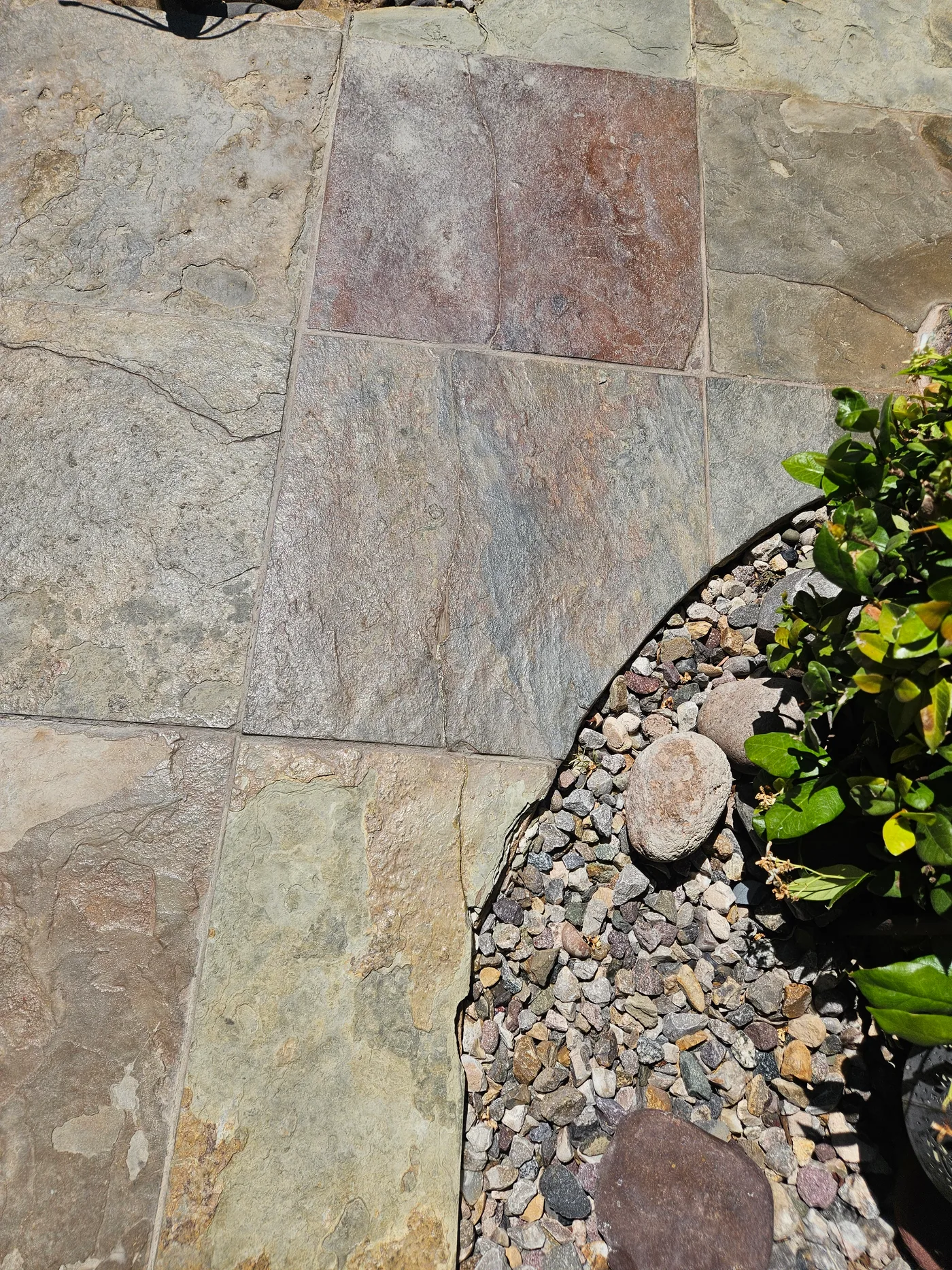 Close-up of faded paver surface before restoration