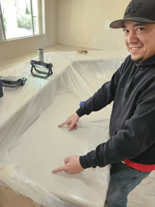 Quartz countertop after a color-matched chip repair