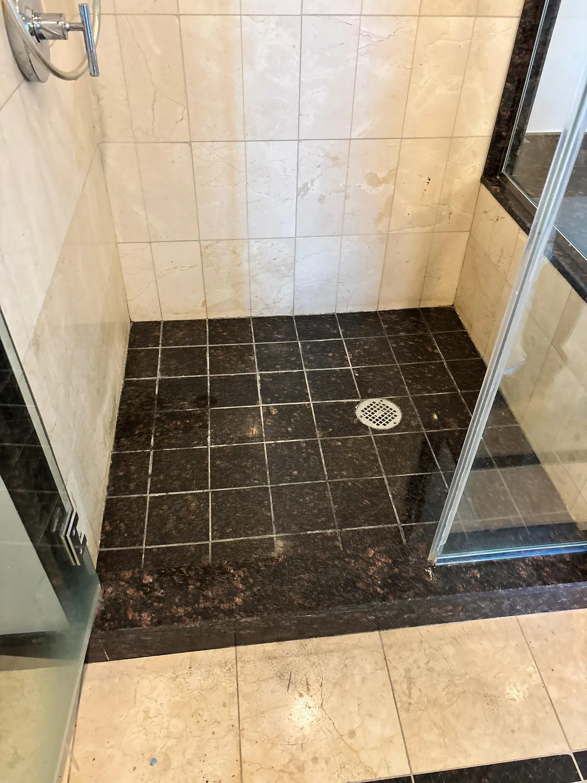 Granite shower floor cleaned and resealed near Sky Las Vegas