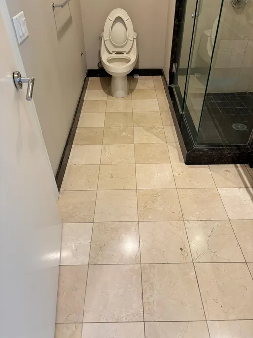 Marble tile bathroom floor at Sky Las Vegas after cleaning and polishing