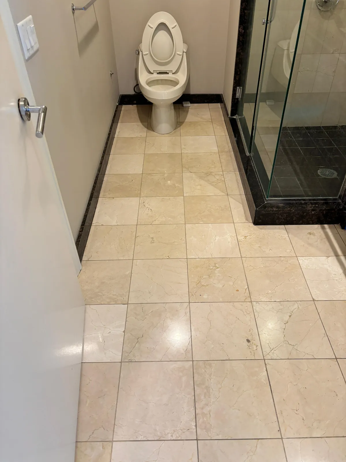 Marble tile bathroom floor polished near Sky Las Vegas
