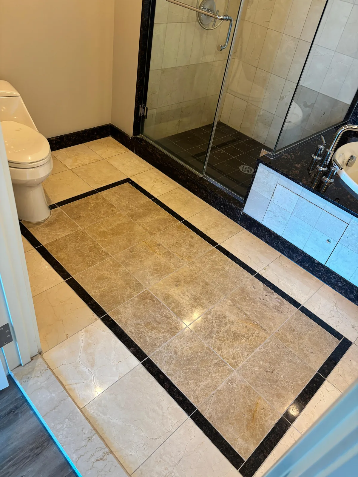 Marble tile floor with granite border cleaned near Sky Las Vegas