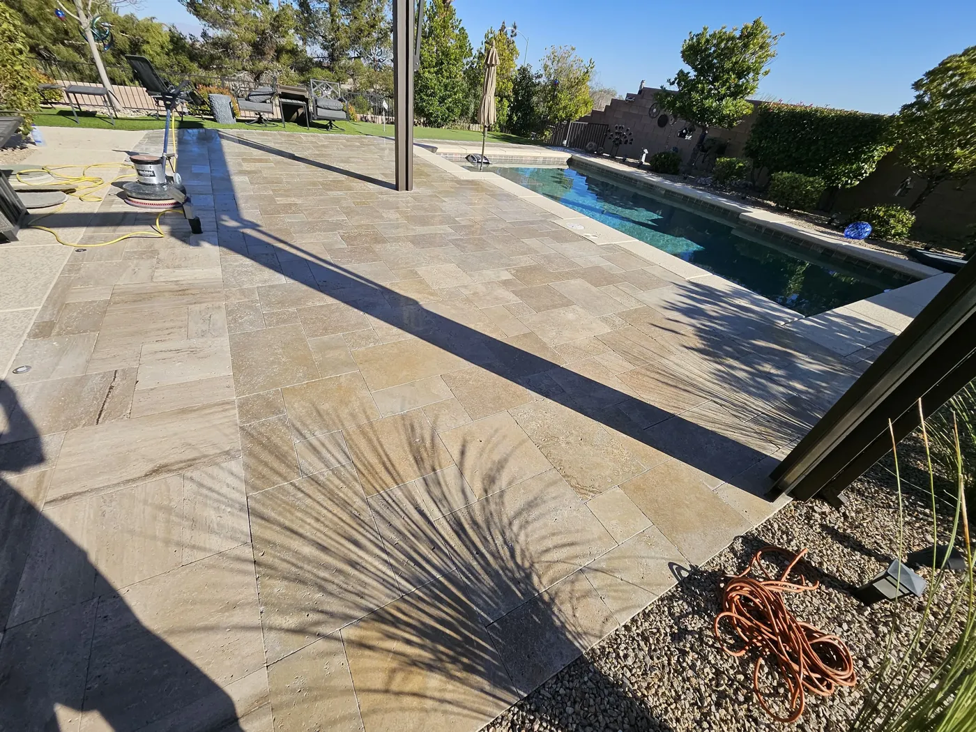 Travertine pool deck after cleaning and restoration, aerial view Las Vegas