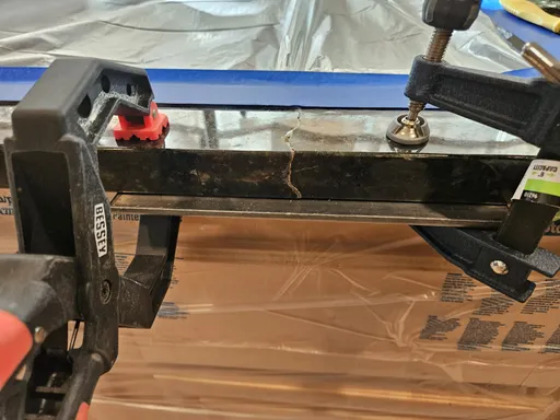 Professional clamp repair on granite crack