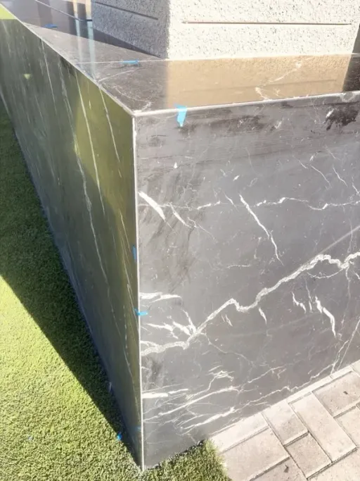 Dull outdoor stone countertop that has lost its finish